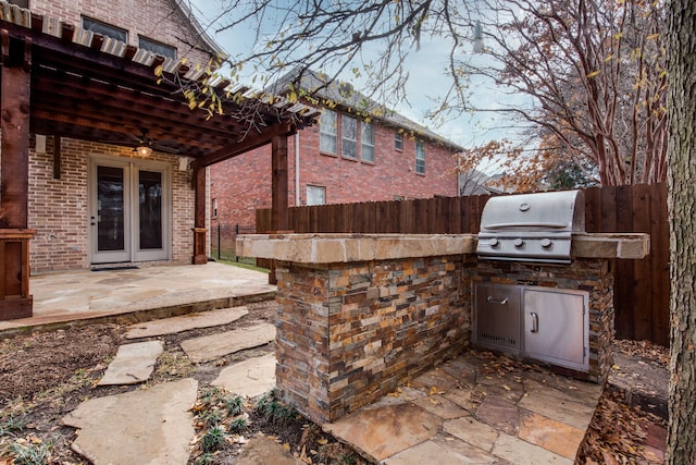 3317 S Riley Ct, Hurst, TX 76054 - fenced backyard with a ceiling fan and a patio