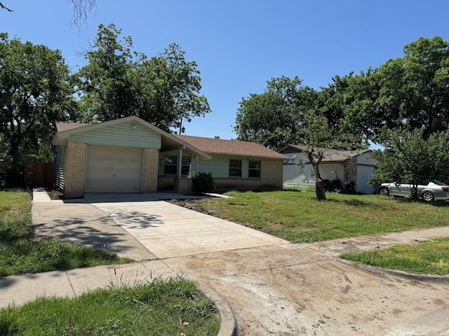3422 Palm Dr, Mesquite, TX 75150 - ranch-style house featuring brick siding, an attached garage, and concrete driveway