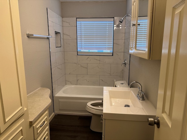3422 Palm Dr, Mesquite, TX 75150 - full bathroom with vanity, toilet, wood finished floors, and  shower combination