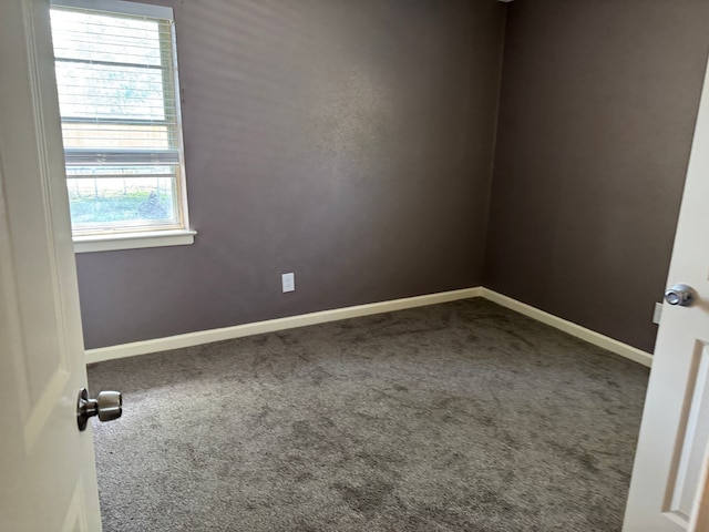 3422 Palm Dr, Mesquite, TX 75150 - carpeted spare room featuring baseboards