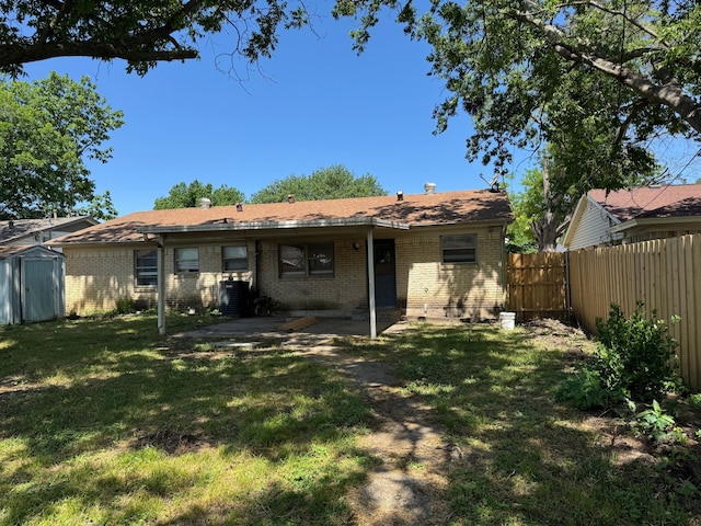 3422 Palm Dr, Mesquite, TX 75150 - rear view of house featuring brick siding and a patio