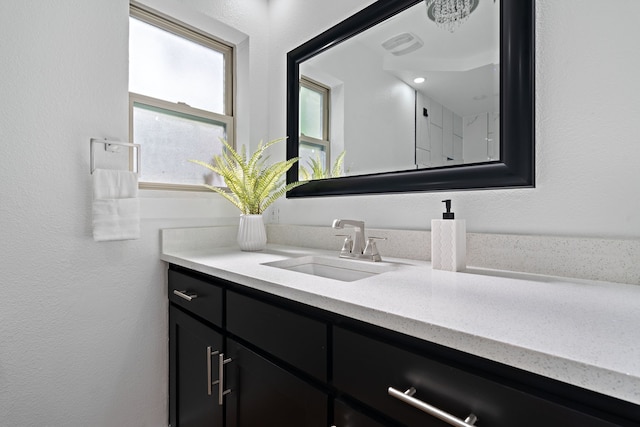 5316 Humbert Ave, Fort Worth, TX 76107 - bathroom featuring vanity and a textured wall