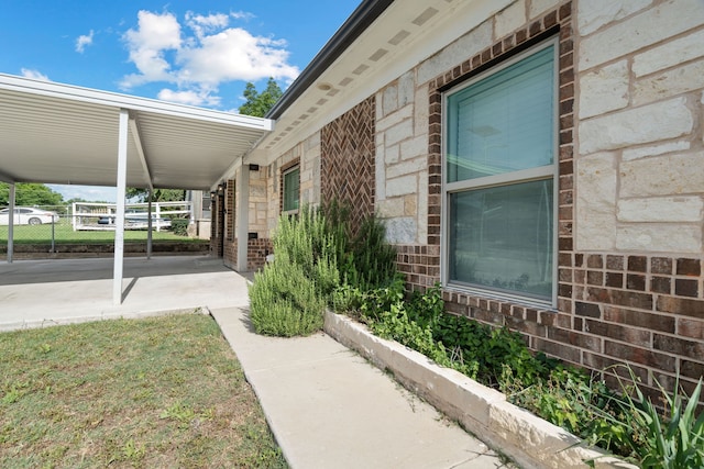 5316 Humbert Ave, Fort Worth, TX 76107 - view of property exterior featuring brick siding and an attached carport