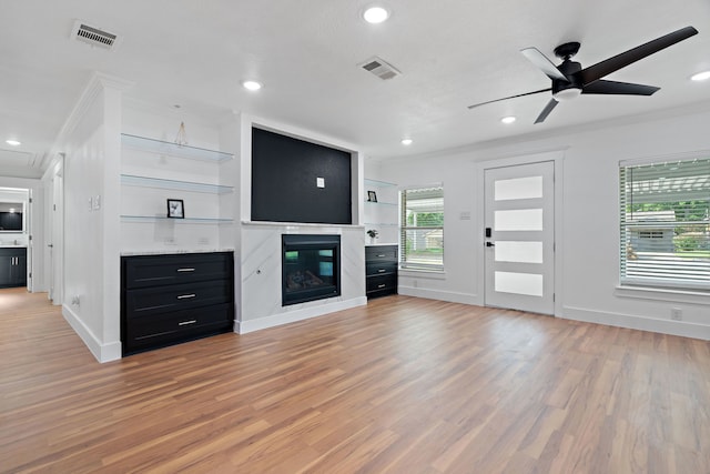 5316 Humbert Ave, Fort Worth, TX 76107 - unfurnished living room featuring ornamental molding, light wood-type flooring, a ceiling fan, baseboards, and recessed lighting