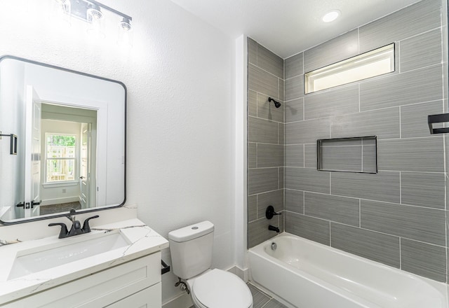 128 Goodman St, Sulphur Springs, TX 75482 - bathroom with toilet, vanity, and bathtub / shower combination