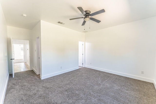 128 Goodman St, Sulphur Springs, TX 75482 - empty room featuring carpet floors, ceiling fan, baseboards, and a smoke detector