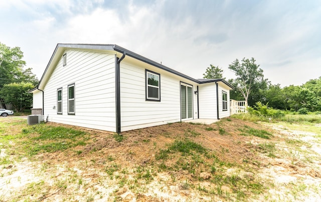 128 Goodman St, Sulphur Springs, TX 75482 - view of home's exterior with central AC unit