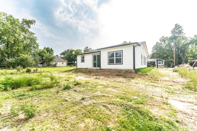 128 Goodman St, Sulphur Springs, TX 75482 - view of rear view of property