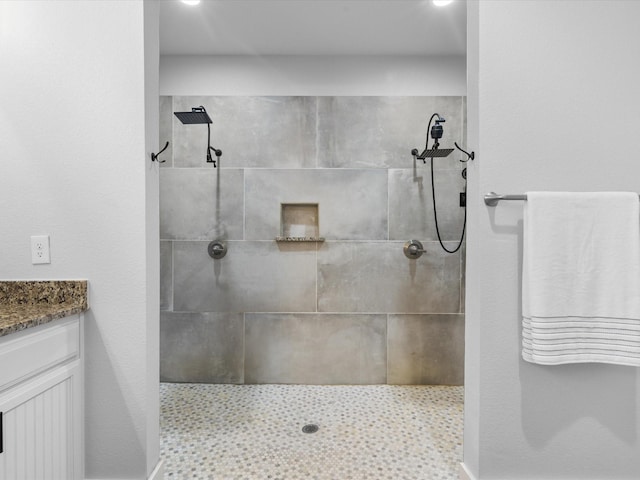 431 Advance Rd, Weatherford, TX 76088 - full bathroom with a tile shower and vanity