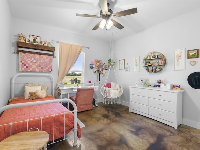 431 Advance Rd, Weatherford, TX 76088 - bedroom with concrete flooring, baseboards, and ceiling fan
