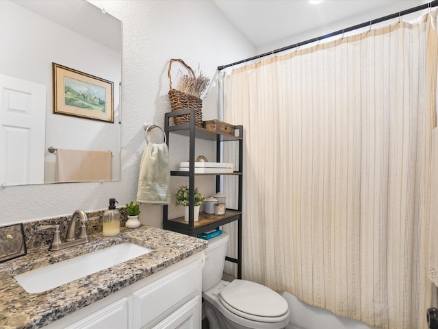 431 Advance Rd, Weatherford, TX 76088 - bathroom with toilet, vanity, shower / bath combination with curtain, and a textured wall