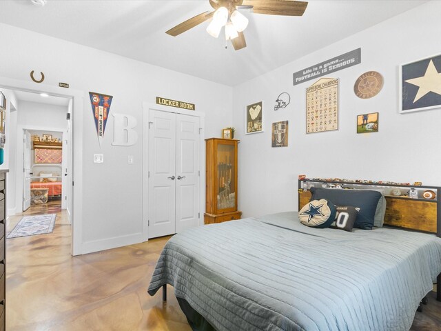 431 Advance Rd, Weatherford, TX 76088 - bedroom featuring finished concrete flooring, a closet, ceiling fan, and baseboards
