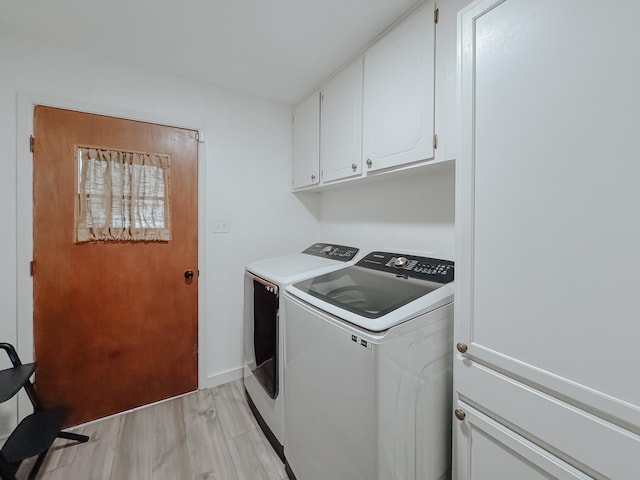 461 E Bradley St, Fairfield, TX 75840 - laundry area with washing machine and clothes dryer, cabinet space, light wood-type flooring, and baseboards