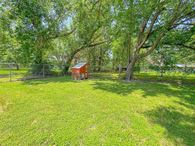 461 E Bradley St, Fairfield, TX 75840 - view of yard featuring an outbuilding and exterior structure