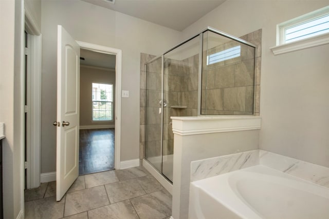 3613 Pisa Mews, Dallas, TX 75236 - full bath with a garden tub, a shower stall, and baseboards