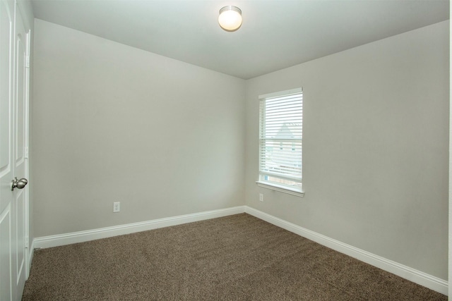 3613 Pisa Mews, Dallas, TX 75236 - spare room featuring dark carpet and baseboards