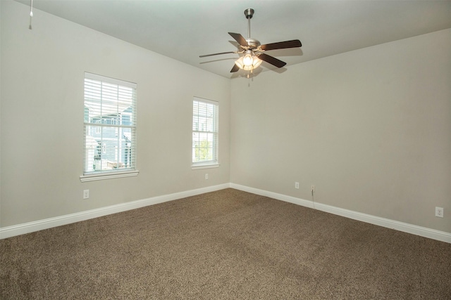 3613 Pisa Mews, Dallas, TX 75236 - empty room with ceiling fan, dark carpet, and baseboards