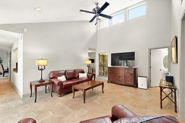 7109 Alpha Rd, Dallas, TX 75240 - living room featuring ceiling fan, a towering ceiling, baseboards, and recessed lighting