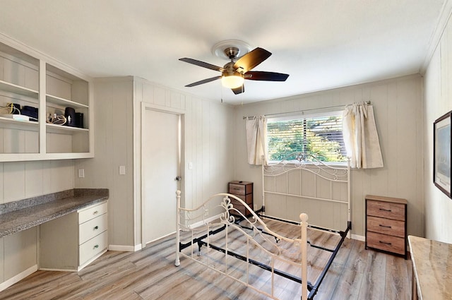 7109 Alpha Rd, Dallas, TX 75240 - bedroom with light wood-type flooring, baseboards, crown molding, and a ceiling fan