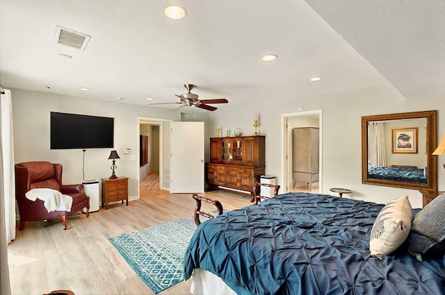 7109 Alpha Rd, Dallas, TX 75240 - bedroom featuring light wood-type flooring, recessed lighting, and a ceiling fan