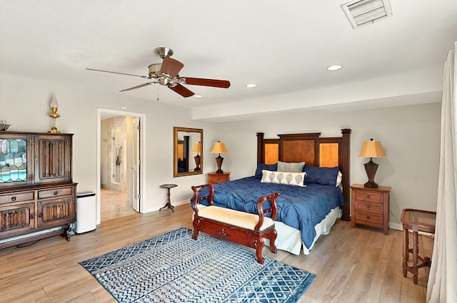 7109 Alpha Rd, Dallas, TX 75240 - bedroom with light wood finished floors, recessed lighting, baseboards, ceiling fan, and ensuite bathroom