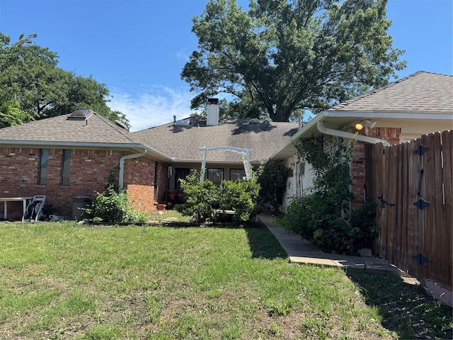 2317 Cliffside Dr, Plano, TX 75023 - view of front of house with brick siding, a shingled roof, and a chimney