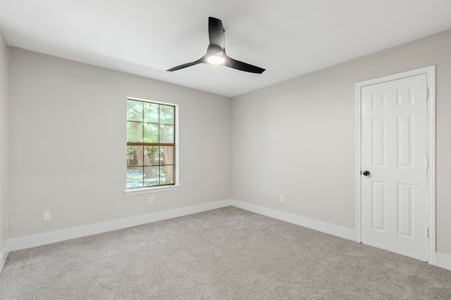 3562 Bent Oak St E, Greenville, TX 75401 - spare room featuring carpet, ceiling fan, and baseboards