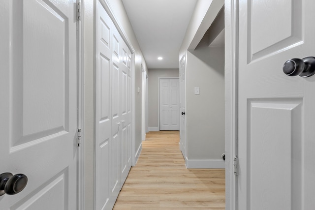 3562 Bent Oak St E, Greenville, TX 75401 - corridor featuring light wood-style flooring, baseboards, and recessed lighting
