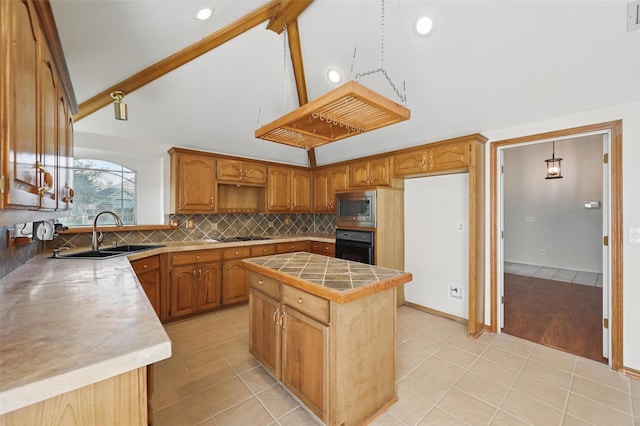 1521 Treeline Dr, Desoto, TX 75115 - kitchen with a sink, black appliances, light tile patterned floors, high vaulted ceiling, and backsplash