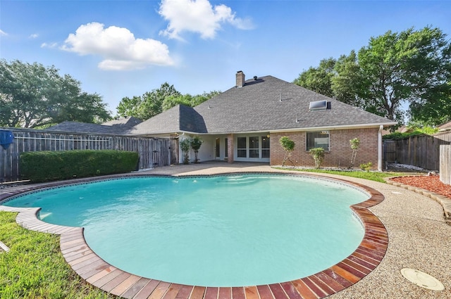 1521 Treeline Dr, Desoto, TX 75115 - view of pool with a fenced backyard and french doors