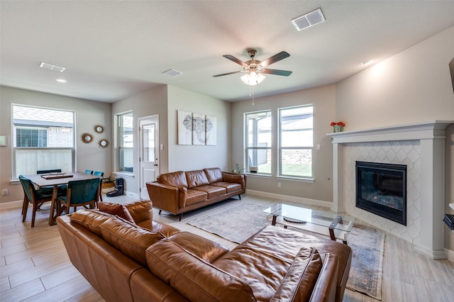 1824 Rachel St, Northlake, TX 76247 - living area featuring plenty of natural light, baseboards, and ceiling fan