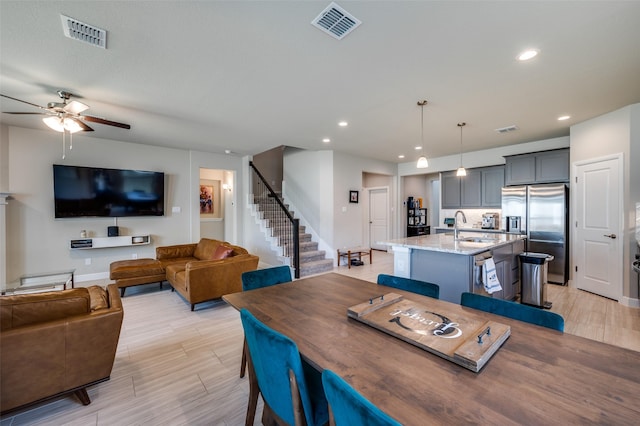 1824 Rachel St, Northlake, TX 76247 - dining space with a ceiling fan, stairway, recessed lighting, baseboards, and light wood-type flooring