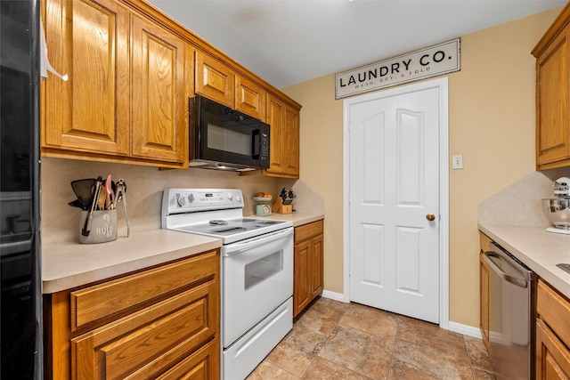 10400 Marigold Rd, Waco, TX 76708 - kitchen featuring black microwave, white electric range, stainless steel dishwasher, and light countertops
