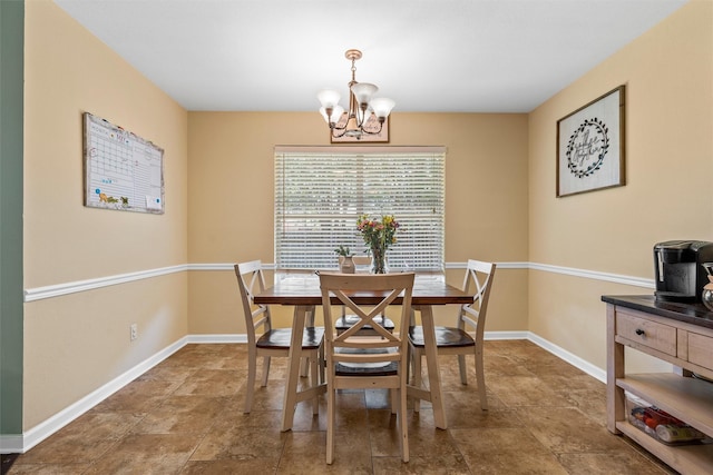 10400 Marigold Rd, Waco, TX 76708 - dining room with a chandelier and baseboards