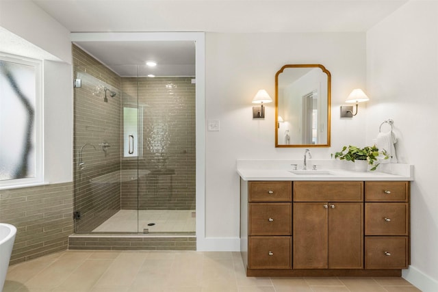 2626 Club Meadow Dr, Garland, TX 75043 - bathroom featuring a stall shower, vanity, tile patterned flooring, and baseboards