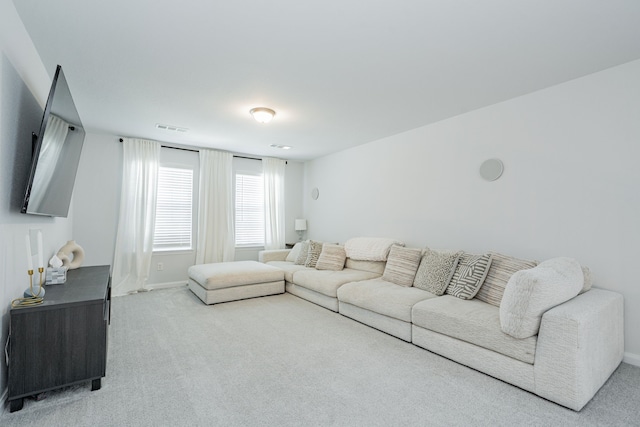 2049 Hartley Dr, Forney, TX 75126 - carpeted living room featuring baseboards