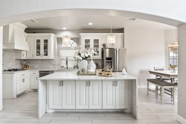 14237 Sugar Hill Dr, Little Elm, TX 75068 - kitchen featuring stainless steel appliances, custom range hood, a sink, a chandelier, and a center island