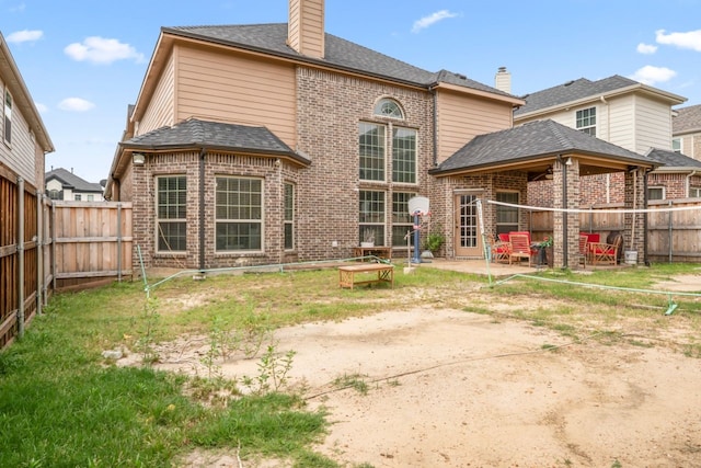 14237 Sugar Hill Dr, Little Elm, TX 75068 - rear view of property with brick siding, a patio, a chimney, and a fenced backyard