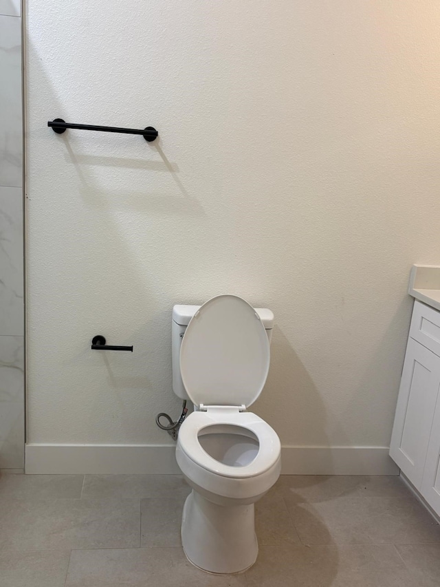 5518 Cold Water Trl, Granbury, TX 76048 - bathroom with baseboards, toilet, and vanity