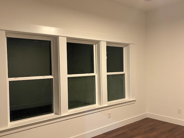 5518 Cold Water Trl, Granbury, TX 76048 - detailed view of baseboards and wood finished floors