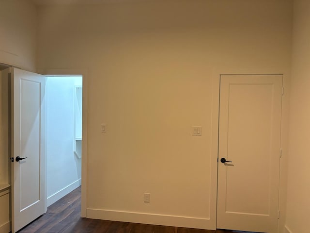 5518 Cold Water Trl, Granbury, TX 76048 - empty room with dark wood-style floors and baseboards