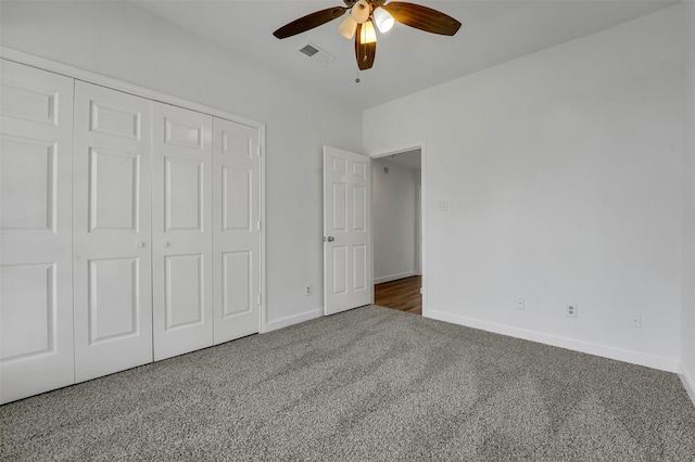 4909 Berkeley Ct, Garland, TX 75043 - unfurnished bedroom with carpet, baseboards, a closet, and ceiling fan