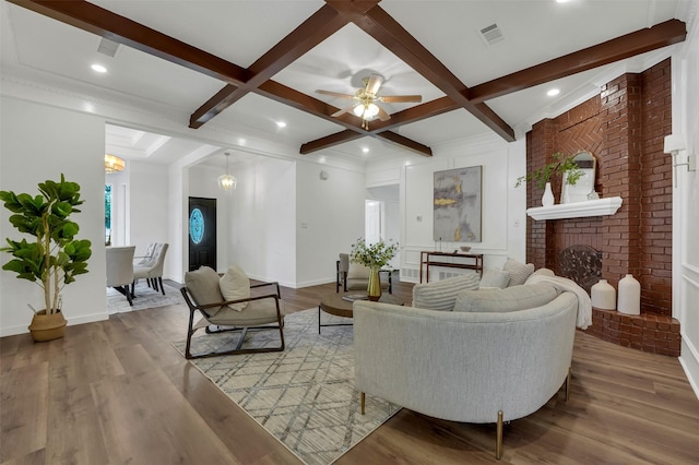 4909 Berkeley Ct, Garland, TX 75043 - living room featuring beam ceiling, coffered ceiling, wood finished floors, baseboards, and recessed lighting