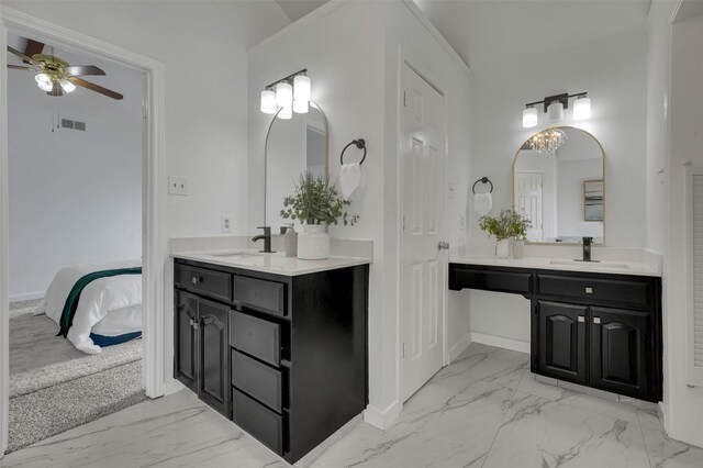 4909 Berkeley Ct, Garland, TX 75043 - full bathroom with marble look tiles, two vanities, and ceiling fan