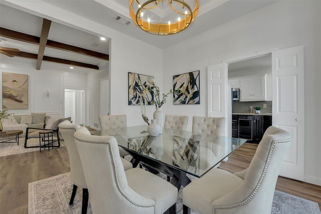 4909 Berkeley Ct, Garland, TX 75043 - dining area with a chandelier, wood finished floors, beam ceiling, and beverage cooler