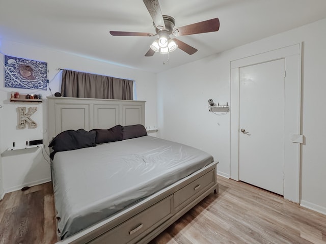 462 Anderson Ln, Fairfield, TX 75840 - bedroom featuring light wood-style floors, baseboards, and ceiling fan