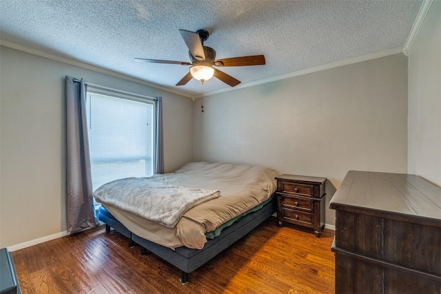6400 Kingswood Dr, Fort Worth, TX 76133 - bedroom featuring wood finished floors, a textured ceiling, crown molding, baseboards, and ceiling fan