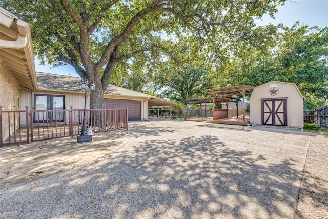 6400 Kingswood Dr, Fort Worth, TX 76133 - view of yard with driveway and a pergola