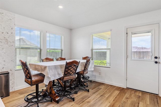 101 Lisa Ln, Royse City, TX 75189 - dining room with light wood-type flooring, healthy amount of natural light, and baseboards