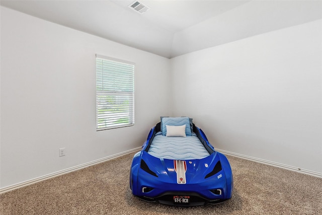 101 Lisa Ln, Royse City, TX 75189 - carpeted bedroom featuring baseboards and lofted ceiling